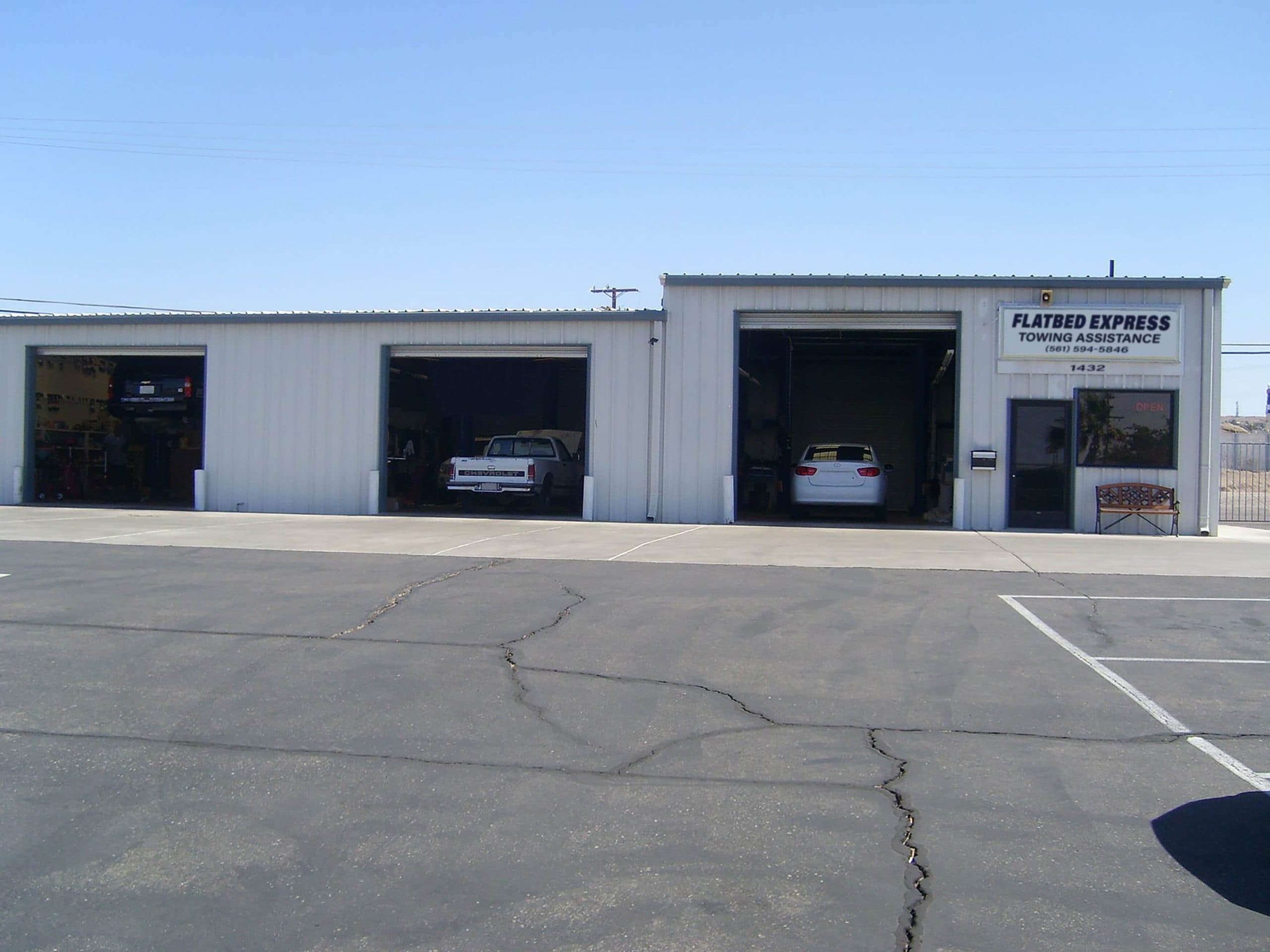 Flatbed Express Towing Assistance shop in Belle Glade, FL